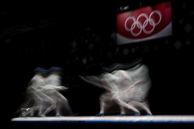 星空体育app官网下载-日媒：菅义伟不考虑取消奥运 男重团体金牌“悲愿”